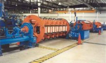 Fast loading rigid stranding line