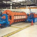 Fast loading rigid stranding line