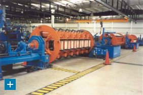 Fast loading rigid stranding line